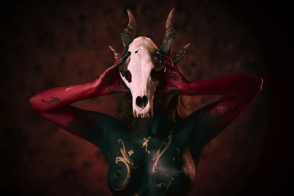 Personal art photograph with a sculptural animal mask